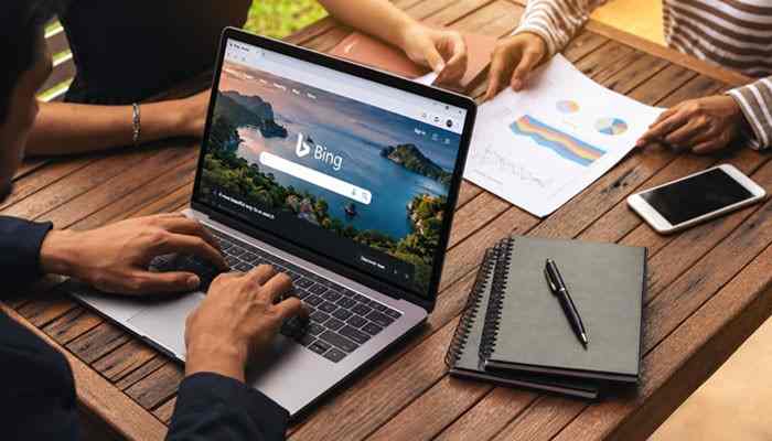 Does Bing SEO Require a Different Keyword Strategy? - Startup Editor | Startup Editor How SEO Works in Bing with professionals reviewing Bing search results, website analytics, and content optimization strategies for improved organic rankings