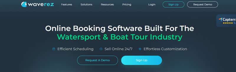 WaveRez - Startupeditor | Startup Editor Hero banner for WaveRez online booking software targeted at watersport and boat tour industry, highlighting scheduling, online selling, and customization with two CTAs: Request a Demo and Sign Up.