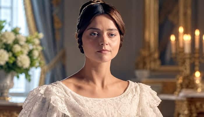 Why Marie Farguss Professional Contribution Matters - Startupeditor | Startup Editor Woman in a white period gown in a candlelit room, accompanying the Marie Fargus Victoria career feature.