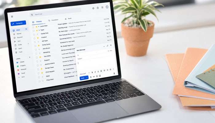 How to End a Business Email in Different Situations - Startup Editor | Startup Editor Laptop displaying an email inbox and new message window, illustrating how to end a business email with an appropriate closing.