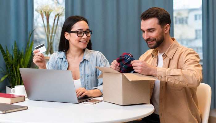 How to Tell Whether a Consumer Incentive Actually Works - Startup Editor | Startup Editor Consumer Incentives in e-commerce showing customers with a payment card, laptop, package, and product, representing online rewards and promotional offers.