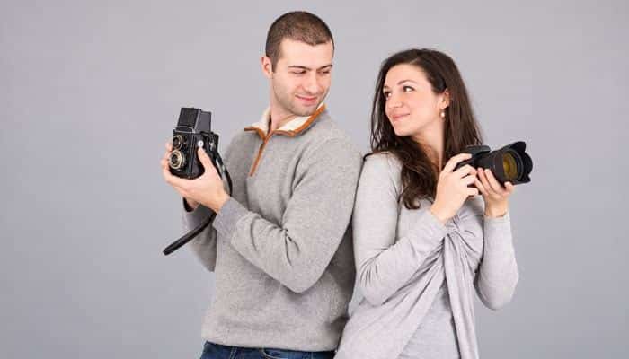 How to Fix Shaky Hands Photography in Low Light - Startup Editor | Startup Editor How to Fix Shaky Hands Photography with proper camera grip and lens support techniques demonstrated by photographers holding different cameras.